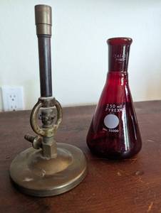 Red Pyrex Beaker And Gas Stand