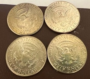 LOT OF 4 NIFC KENNEDY HALF DOLLARS