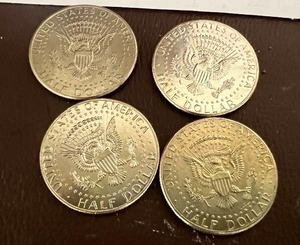 LOT OF 4 NIFC KENNEDY HALF DOLLARS