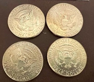 LOT OF 4 NIFC KENNEDY HALF DOLLARS
