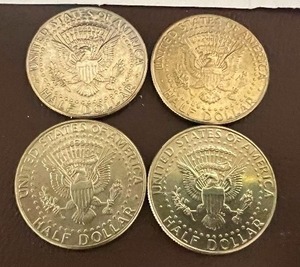 LOT OF 4 NIFC KENNEDY HALF DOLLARS