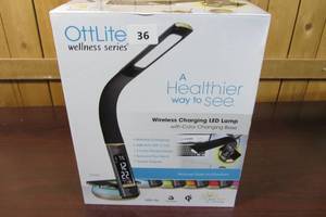lot 36 image: OttLite LED Desk Lamp with Clock and Wireless Color Changing Charging Station