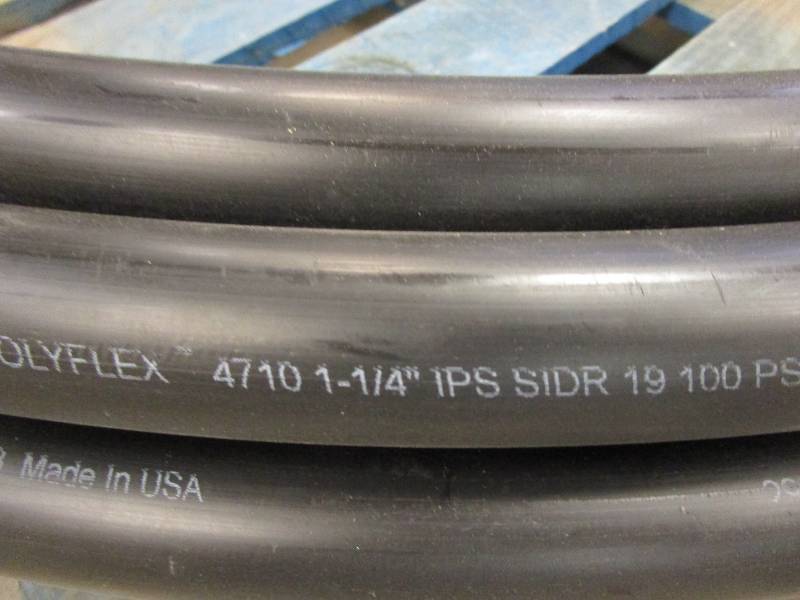 lot 574 image: Advanced Drainage Systems 1-14 in. x 100 ft. IPS 100 psi NSF Poly Pipe