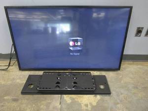 lot 8 image: LG 50 Class 1080P LED TV with Smart TV (Missing Remote), 50LN5700, Includes Wall Mount (Missing Mounting Hardware) - SOLD AS IS