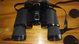 lot 64 image: Bushnell Falcon Binoculars.