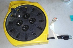 lot 125 image: Multi Electrical Outlet Reel.