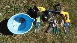 lot 18 image: Garden And Lawn Care. Grass trimmer with battery and charger untested