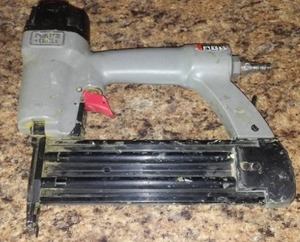lot 189 image: Porter Cable Air Nailer.
