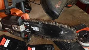 lot 283 image: Black-N-Decker 20Volt Lithium set. Chainsaw and weed wacker. See pics