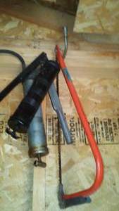 lot 292 image: Grease Guns (2) And Bow Saw.