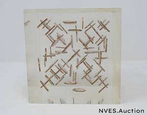 lot 44 image: Lucite pennies in Resin