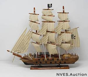 lot 72 image: Vintage Model pirate ship in wood Stained glass sailboat Black and gold zodiac