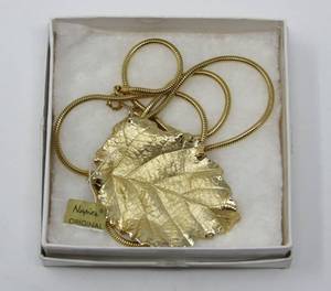 lot 289 image: Napier Gold Leaf necklace from 1973 with tags