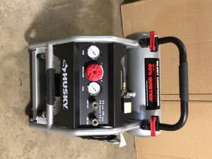 Husky 4.5 Gal. Portable Electric-Powered Silent Air Compressor    Customer Returns See Pictures
