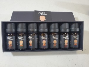 lot 276 image: New Vybe Source 7 Piece Essential Oil Chakra Set