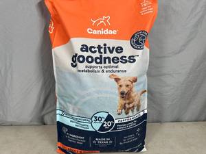 lot 105 image: New 30 lb Bag of Canidae Adult and Puppy Dog Food