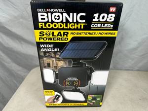 lot 114 image: New Bionic Solar Powered Remote Control  Motion Dectecting Spotlight
