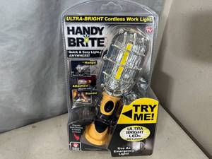 lot 176 image: New Handy Brite Cordless Work Light