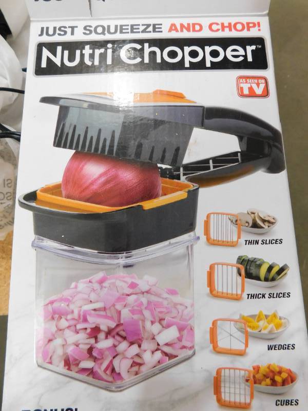 lot 84 image: Nutri Chopper 5-in-1 Compact Portable Handheld Kitchen Slicer with Storage Container