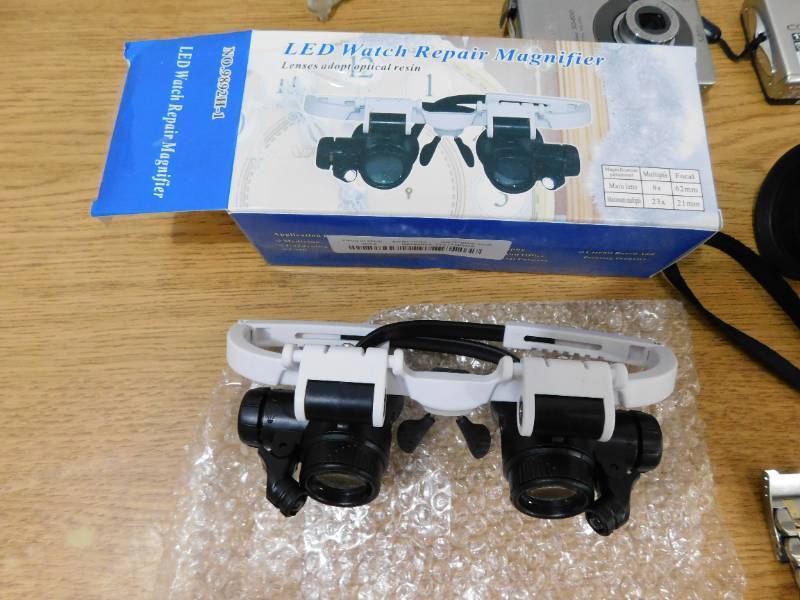 lot 156 image: Space Scope, Digital Camera, Magnifier Glasses, Watchs Lot