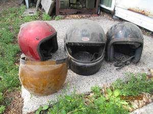 lot 35 image: 3 helmets and 1 visor.  One helmet ...