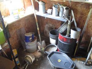 lot 42 image: antique oil cans, oil barrel with t...
