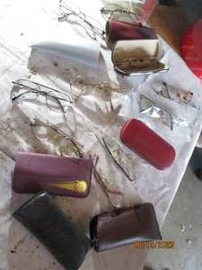 lot 56 image: bag of eye glasses with cases...