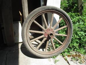 lot 68 image: Wheel with wooden spokes...