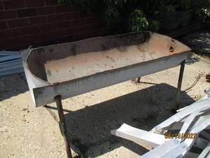 lot 106 image: metal water trouh on a stand...