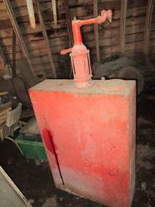 lot 184 image: Old gas pump  container...