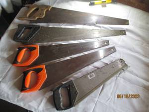 lot 2 image: 5 Hand saws, 1 with wooden handle...