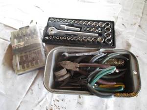 lot 18 image: Pan full of pliers, hobby knife set...