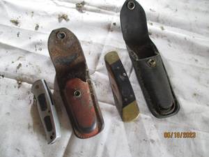 lot 28 image: Larger pocker knives in cases...
