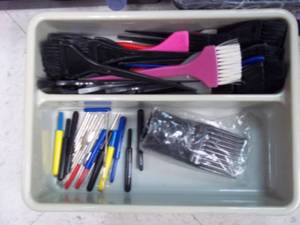 lot 17 image: Curlers, clips and combs aplenty