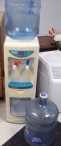 lot 25 image: Haier HotCold top loading water dispenser