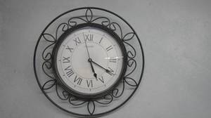 lot 91 image: All hanging wall decor, dry-erase broom etc