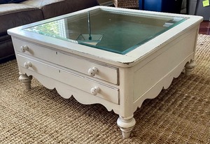 lot 10 image: Distressed Two Drawer Display Glass Top Coffee Table