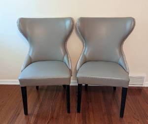 lot 21 image: Pair of Grey Faux Leather and Tufted Back Side Chairs