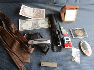 lot 17 image: Alarm Clock, Leather Tie, Rodeo Button