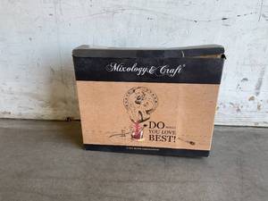 lot 115 image: Mixology & Craft 11-Piece Stainless Steel Bar Tool Set with Rustic Wood Stand
