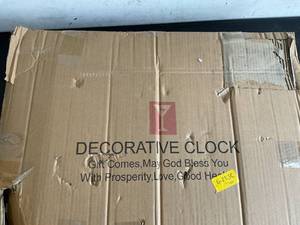 lot 179 image: FLEBLE Large Pendulum Battery Operated Non-Ticking Decorative Square White Wood Wall Clock with Gold and Black Numerals