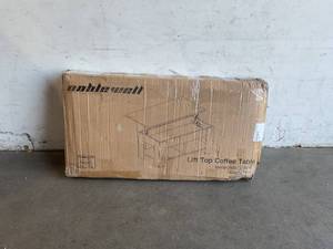 lot 32 image: NOBLEWELL Black Lift Top Coffee Table with Storage Compartment and Shelf