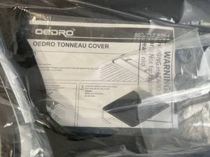 lot 51 image: Oedro 6.6 ft Bed Quad Fold Tonneau Soft Truck Cover