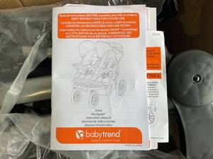 lot 64 image: Baby Trend Navigator Tropic Double Jogger Stroller