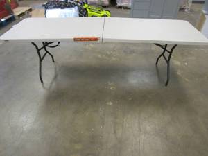 lot 303 image: Lifetime 8 ft. Fold-in-Half Table Almond (TOP IS SCUFFED)