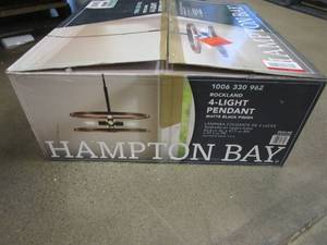 lot 392 image: Hampton Bay Rockland 4-Light Matte Black Round Drum Pendant Hanging Light, Industrial Style Kitchen Pendant (OPEN BOX)