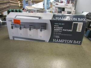 lot 426 image: Hampton Bay Regan 29.13 in. 4-Light Espresso Bronze Bathroom Vanity Light with Clear Glass Shades (OPEN BOX)