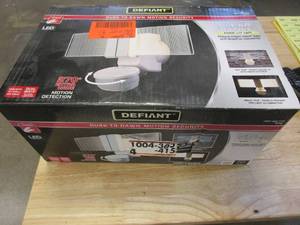 lot 481 image: Defiant 270 Degree Integrated LED Motion White Outdoor Flood Light with Clearview Edgelit Translucent Light Panel Technology (OPEN BOX)