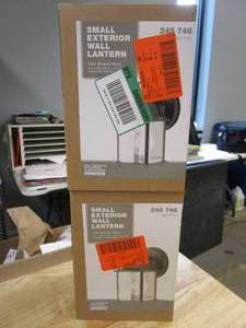lot 566 image: 2 PACK - Hampton Bay 8.5 in. Black Decorative Outdoor Coach Wall Lantern with Clear Glass Shade