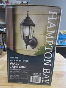 lot 576 image: Hampton Bay 14.5 in. Black Dusk to Dawn Decorative Outdoor Wall Lantern (OPEN BOX)